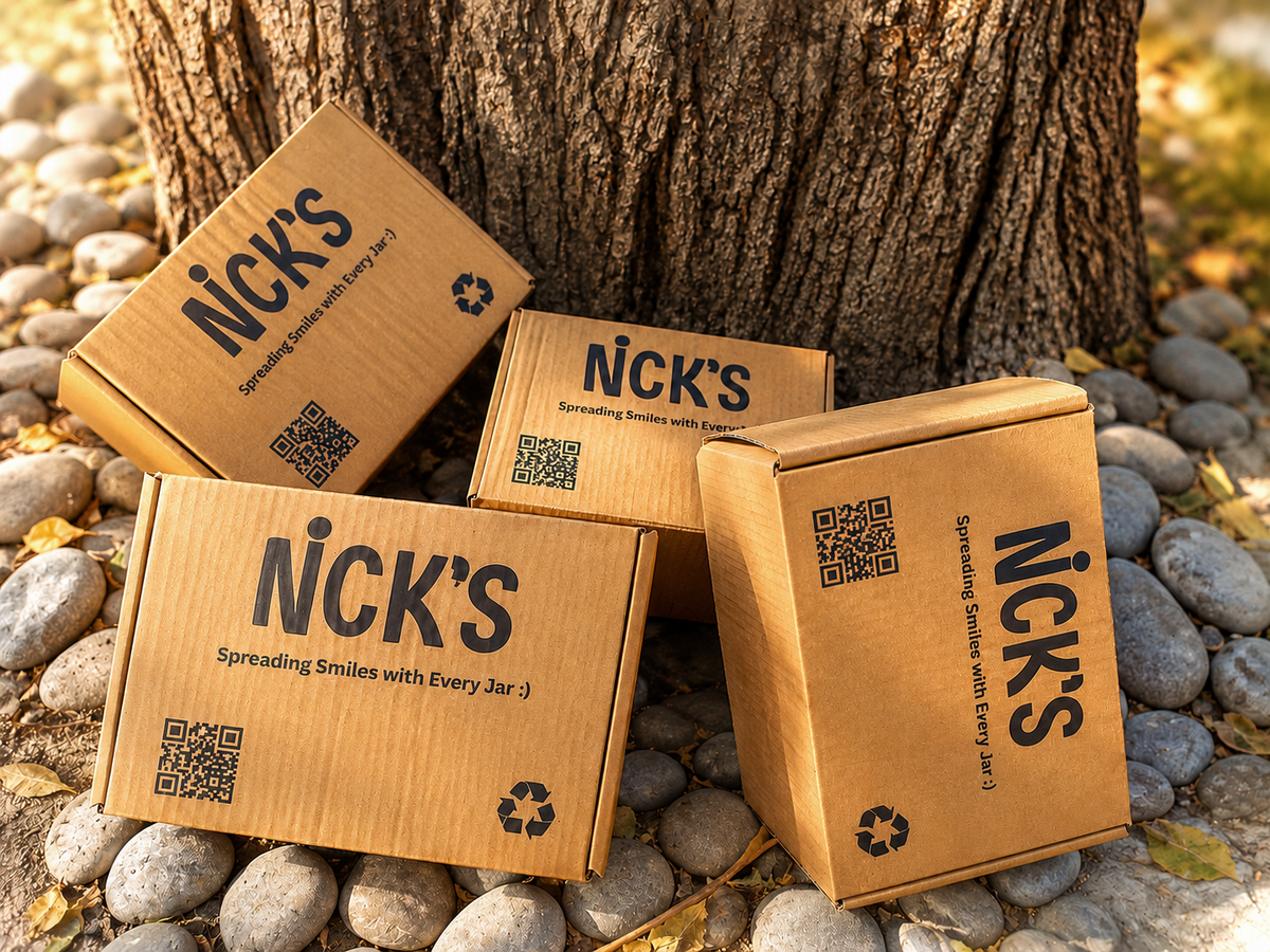 Close-up of a recyclable NICK'S box printed with spreading smiles with every jar